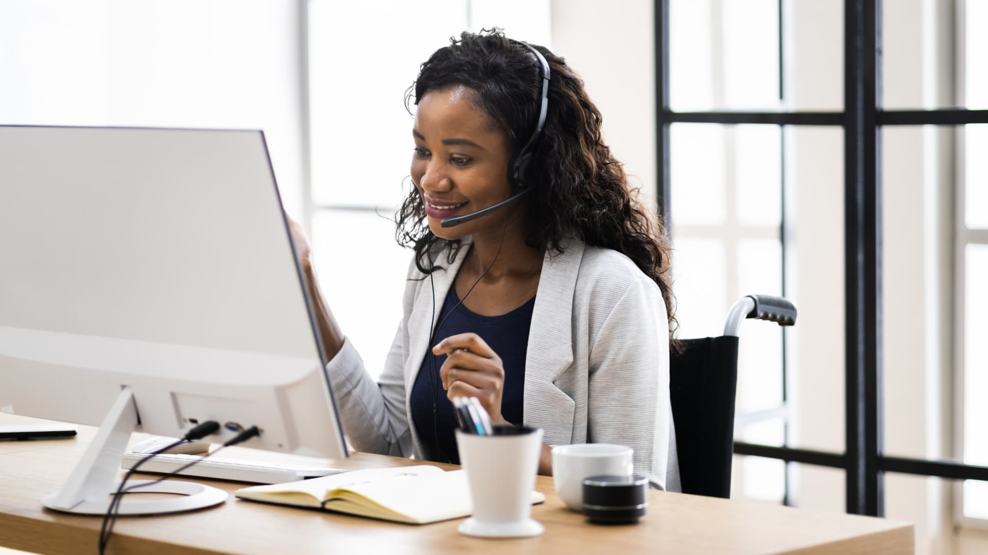 Virtual assistant using a headset at a computer